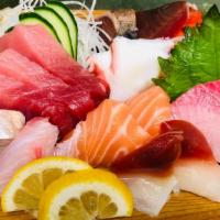 Sashimi (Dinner) · Assorted sliced raw fish come with rice. Served with kobachi, miso soup, and fruits.