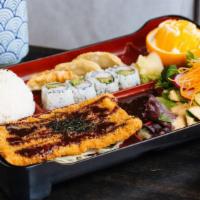 Obento · An assorted box dinner with sashimi, prawn tempura, chicken teriyaki, and fried oyster. Serv...