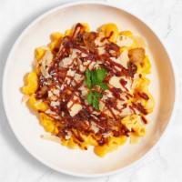 A New Bbq Hope (Mac) · Caramelized onions, bbq cheese sauce, and roasted spicy chicken cooked in a blend of creamy ...