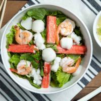 Seafood Egg Noodle · Shrimps, squid, fish balls, and imitation crab.