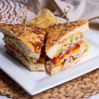 California Turkey Sandwich · Thin sliced turkey breast, bacon, american cheese, shredded lettuce, tomato and avocado with...