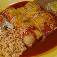 Tamale Plate · 3 tamales poblano or pork smothered w/ green chile and beans.