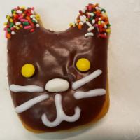 Kitty Donut · Raised donut with M&M's eyes and jellybean nose chocolate icing