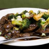 Broccoli Beef · Broccoli florets and house sauce.