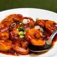 Shandong Prawns · Spicy. Minced garlic, ginger, and chili tomato sauce.
