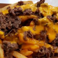 Philly Fries · Topped with steak and whiz.