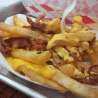 Bacon Cheese Fries · Topped with bacon and whiz.