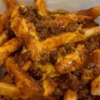 Chili Cheese Fries · Topped with chili and whiz.