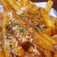 Atomic Garlic Parm Fries · Our garlic parm fries seasoned with ghost pepper seasoning.