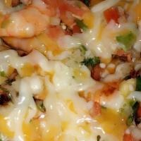 Shrimp · Beans, cheese, sour cream, guacamole, and Mexican salsa.