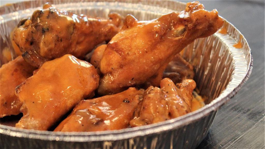 Wings · Fried chicken wings seasoned with our own blend of spices and tossed in your choice of sauce: Buffalo, BBQ, Garlic Parmesan, Teriyaki, Lemon Pepper, Honey Chipotle.
