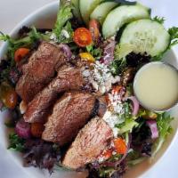 Washington Avenue Steak Salad · Four ounce top sirloin, European lettuce mix, tomatoes, cucumbers, red onions, feta crumbles...