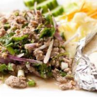 Beef Salad · Tender grilled beef mixed with shallot, tomatoes, green onions, carrots, cilantro, cucumber,...