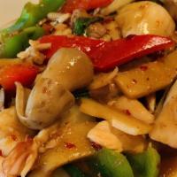 Pad Kee Mao · Sautéed with meat, broccoli, bell peppers, carrots, mushrooms and Thai basil with special sa...