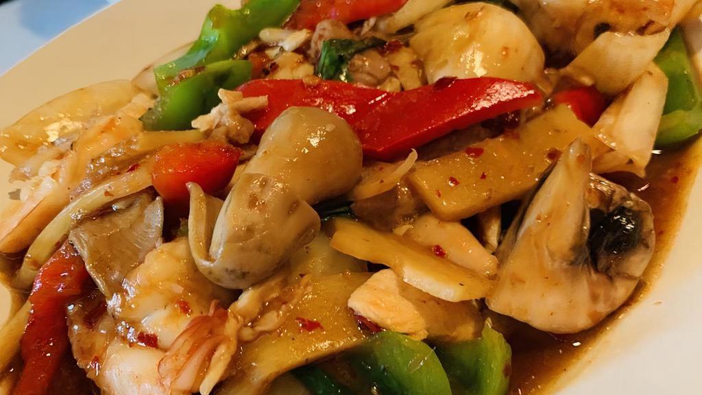 Pad Kee Mao · Sautéed with meat, broccoli, bell peppers, carrots, mushrooms and Thai basil with special sauce. Includes steamed jasmine rice.