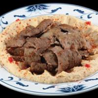 Hummus With Gyro Meat · A mixture of mashed chickpeas, tahini, olive oil, lemon juice, and garlic. Topped with gyro ...