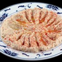 Baba Ganoush · Vegetarian. Mashed roasted eggplant, tahini, olive oil, lemon juice, and garlic, served as a...