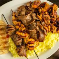 Combo Mix Plate · Gyro meat, chicken gyro meat, beef kabob, and chicken kabob.