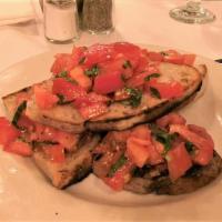 Bruschetta · Roma tomatoes, garlic, olive oil on toasted crostini