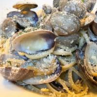 Linguine Alle Vongole · Linguine with market-fresh manila clams, garlic, lemon, and white wine.