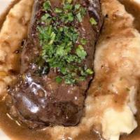Brasato · Red wine demi glace braised beef short ribs, fresh herbs, served with mashed potatoes