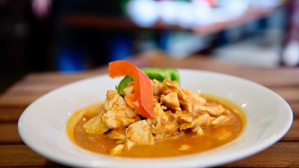 Panang Curry · panang curry paste with coconut milk, peas & carrots, thai basil, red bell pepper, kaffir lime leaves