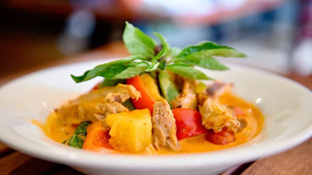 Red Curry · red curry paste with coconut milk, peas & carrots, thai basil, red bell pepper