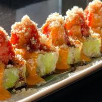 Fuji Roll · Yellowtail, spicy crab, avocado, jalapeno in soy paper topped w/ spicy tuna, spicy mayo, eel...