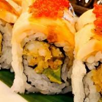 White Tiger Roll · Shrimp tempura, avocado inside, topped w/ white tuna, spicy mayo, tobiko.