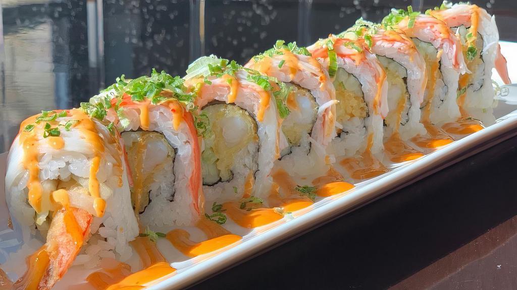 Lava Roll · Shrimp tempura, cucumber inside, topped with crab stick, spicy mayo, scallion.