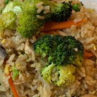Fried Rice · Stir fried rice with peas, carrots and egg.