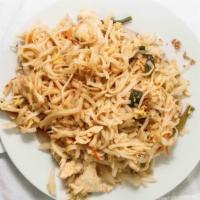 Pad Thai · Stir fried wide rice noodlews, egg, bean sprouts, scullion, carrot, and rousted punut in che...