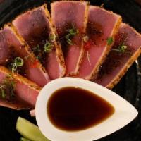 Seared Tuna Sashimi · Seared tuna with ponzu sauce, yuzu sauce, scallion, masago, sesame.
