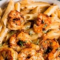 Seafood Pasta · Our seafood pasta is made with penne noodles, creamy homemade seafood sauce, broccoli and ou...