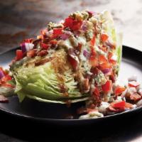 Classic Wedge Salad · Crisp wedge of iceberg drizzled with ranch and balsamic dressing topped with hickory bacon, ...