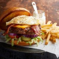 Farmhouse Burger · Smoked bacon, over-easy fried egg, American cheese, lettuce and tomato