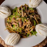 Gochu Japchae · Stir-fried pork, green bell peppers, and shiitake mushrooms. Served with steamed buns on the...