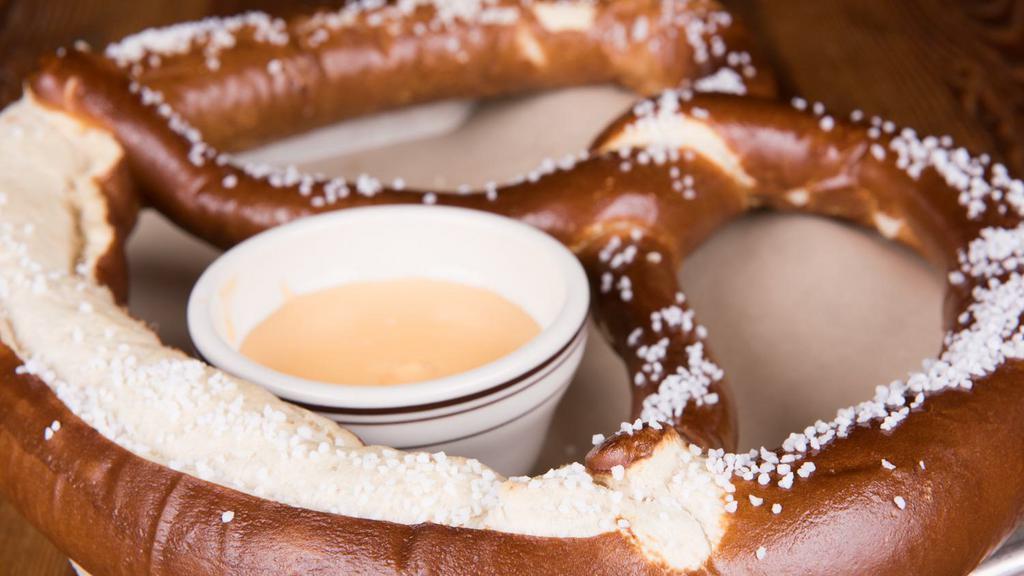 The Gigantic Pretzel · A one-pound giant pretzel served with our creamy beer cheese sauce, featuring grain belt premium.