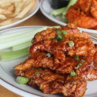 Boneless Wings & Fries · Two orders of our Boneless Wings along with a generous helping of Fries. Two sauce choices f...