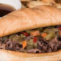 Prime Rib French Dip · Half-pound of thinly sliced prime rib on a toasted garlic hoagie bun with a side of au jus. ...