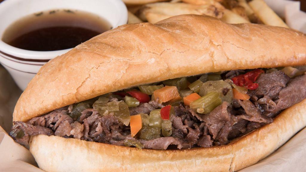 Prime Rib French Dip · Half-pound of thinly sliced prime rib on a toasted garlic hoagie bun with a side of au jus. Add cheese, mild giardiniera mix for additional charges.