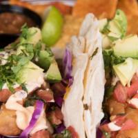 Fish Tacos · Beer-battered cod, cabbage, romaine, cholula mayo, pico, avocado, pepper jack, and fresh cil...