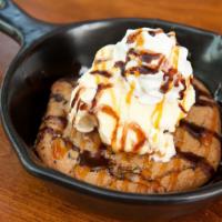Chocolate Chip Lucy · A large chocolate-chunk cookie stuffed with cream cheese and topped with vanilla ice cream –...