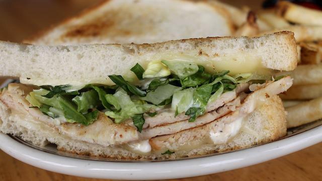 Fresh Turkey Sandwich · Thick-sliced turkey, Monterey jack cheese, ranch dressing, and romaine on white bread.