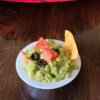 Side Of Guacamole · A creamy dip made from avocado.