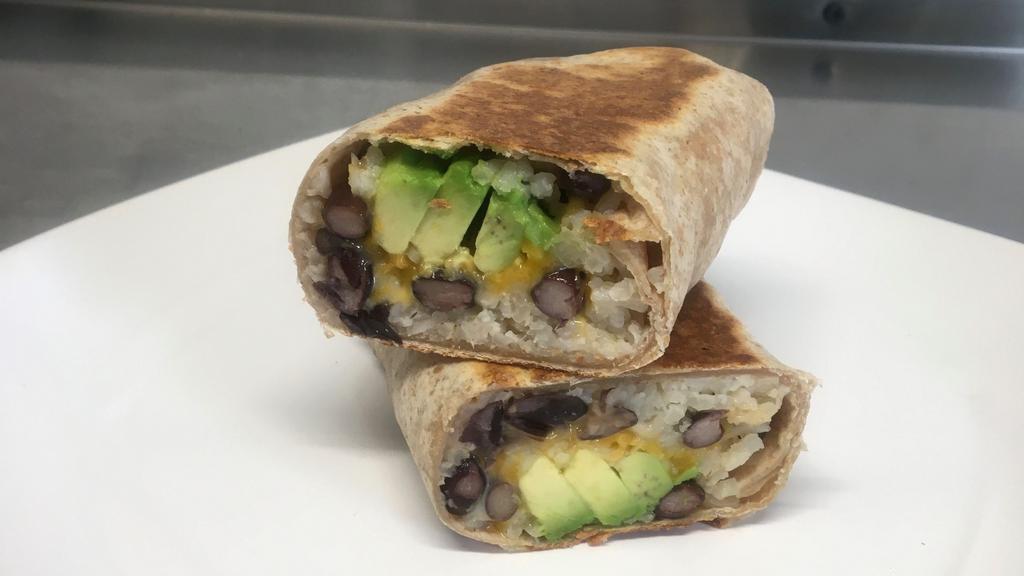 Super Wrap Vegetarian (Grilled Hot) · Organic Black Beans, Spanish rice,  house Salsa, Cotija Cheese, Cilantro,  sliced Avocado, grilled until golden brown. Served with gluten-free tortilla chips, lime wedge, Avocado sauce and Sweet Chili dipping sauce.
