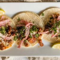 Steak Tacos · Gochujang/Pickled Onion/Cilantro/Cotija Cheese