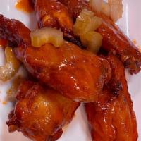 Buffalo Wings · Mild or Hot/Garnished with Pickled Celery
