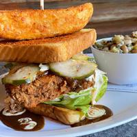 Pdx Hot Chicken Sandwich · Fried Chicken Thigh, Zesty Ranch, Pickles, Maple Sarat Gat Sauce on Texas Toast