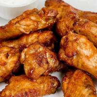 Wings (12 Pieces) · 12 traditional wings. 
Served with ranch.